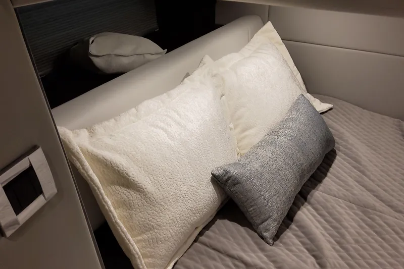Slide: The Image of Luxurious bedding in the 2026 Formula 380 Super Sport Crossover OB cabin. - 101