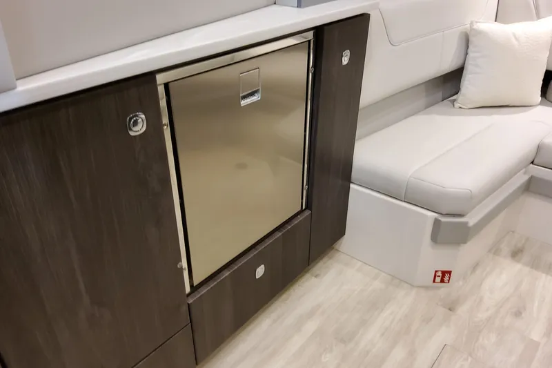 Slide: The Image of 2026 Formula 380 Super Sport Crossover OB interior with sleek cabinetry and comfortable seating. - 104