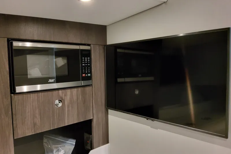 Slide: The Image of Microwave and TV in 2026 Formula 380 Super Sport Crossover OB interior. - 109