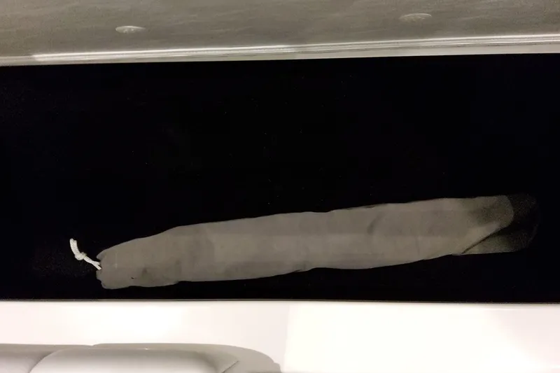 Slide: The Image of Storage compartment in a 2026 Formula 380 Super Sport Crossover OB boat. - 118