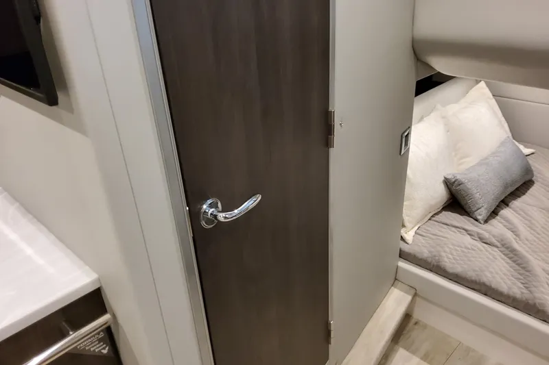 Slide: The Image of Interior of 2026 Formula 380 Super Sport Crossover OB, featuring a cozy cabin bed. - 119