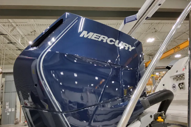 Slide: The Image of 2026 Formula 380 Super Sport Crossover OB with Mercury engine in a showroom. - 12