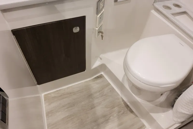 Slide: The Image of Bathroom interior of 2026 Formula 380 Super Sport Crossover OB boat. - 120