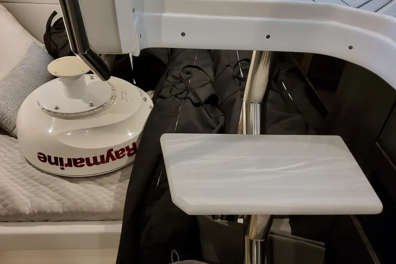 Slide: The Image of 2026 Formula 380 Super Sport Crossover OB interior with Raymarine equipment. - 128