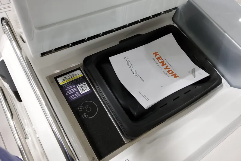 Slide: The Image of 2026 Formula 380 Super Sport Crossover OB grill with Kenyon owner's manual. - 23