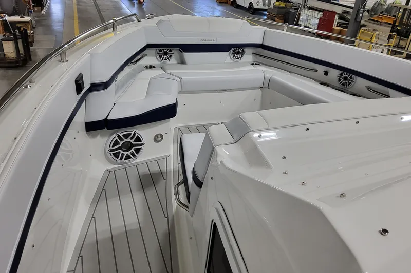 Slide: The Image of 2026 Formula 380 Super Sport Crossover OB boat interior with sleek seating and modern design. - 24