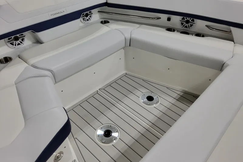 Slide: The Image of 2026 Formula 380 Super Sport Crossover OB boat interior with sleek seating and modern design. - 25