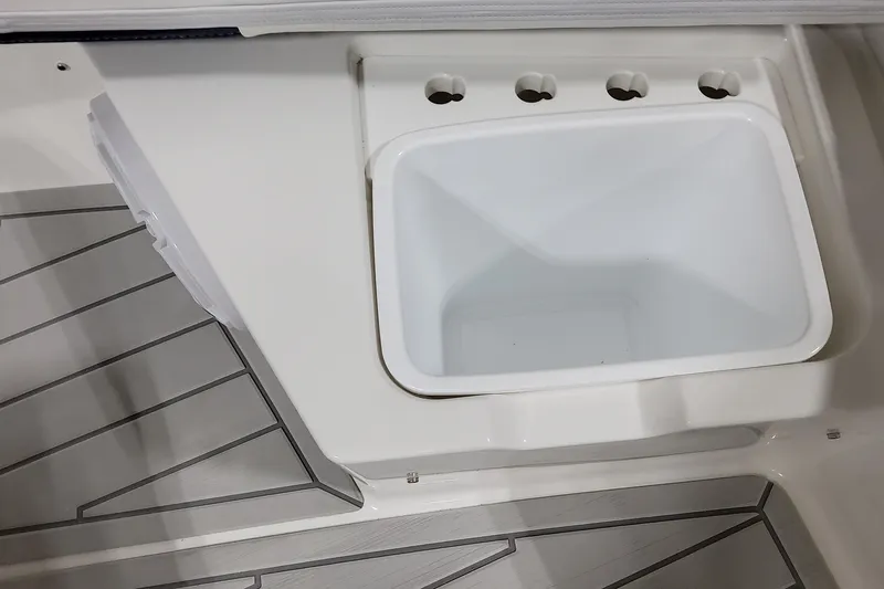 Slide: The Image of 2026 Formula 380 Super Sport Crossover OB boat interior with storage compartment. - 39