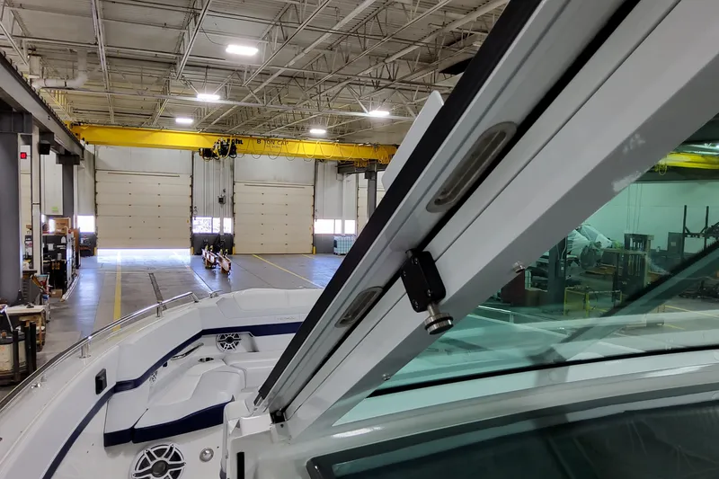 Slide: The Image of 2026 Formula 380 Super Sport Crossover OB in a spacious indoor facility. - 40