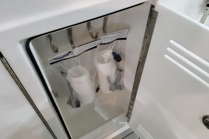 Slide: The Image of Storage compartment in a 2026 Formula 380 Super Sport Crossover OB boat. - 47