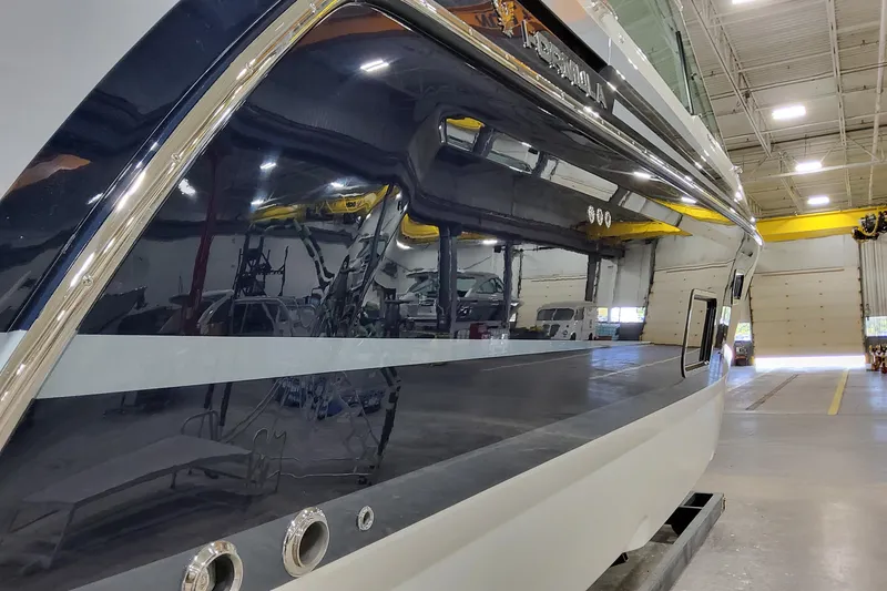 Slide: The Image of 2026 Formula 380 Super Sport Crossover OB in a spacious indoor facility. - 5