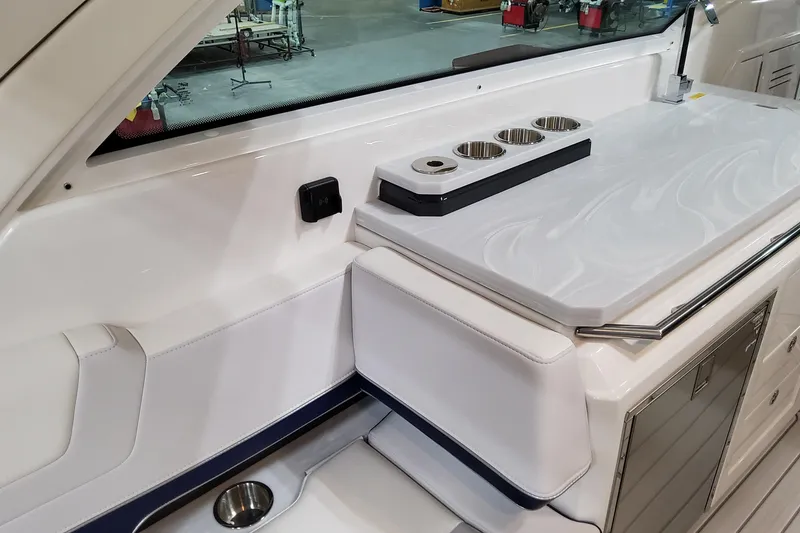 Slide: The Image of Interior of 2026 Formula 380 Super Sport Crossover OB, featuring sleek white seating and countertop. - 52