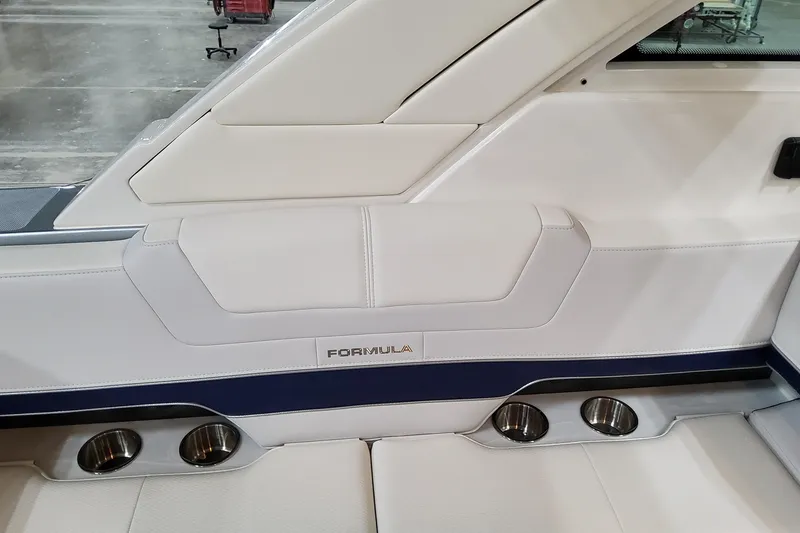 Slide: The Image of Interior seating of 2026 Formula 380 Super Sport Crossover OB with cup holders. - 53