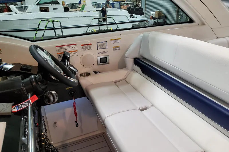 Slide: The Image of Interior of 2026 Formula 380 Super Sport Crossover OB, featuring sleek seating and modern controls. - 69