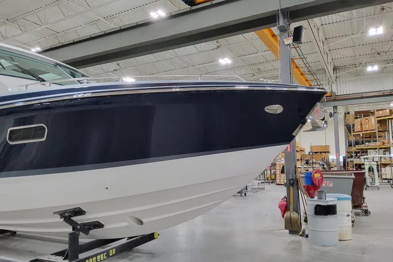 Slide: The Image of 2026 Formula 380 Super Sport Crossover OB in a warehouse setting. - 7