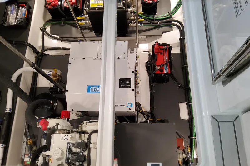 Slide: The Image of Engine compartment of 2026 Formula 380 Super Sport Crossover OB with Seakeeper system. - 75