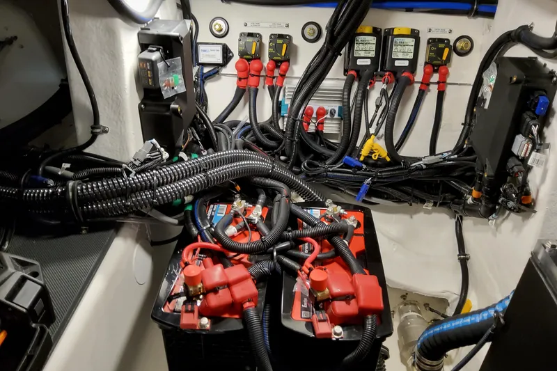 Slide: The Image of Electrical system of 2026 Formula 380 Super Sport Crossover OB boat, featuring batteries and wiring. - 82