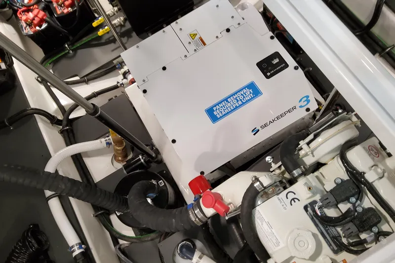 Slide: The Image of Engine compartment of 2026 Formula 380 Super Sport Crossover OB with Seakeeper 3 stabilizer. - 88