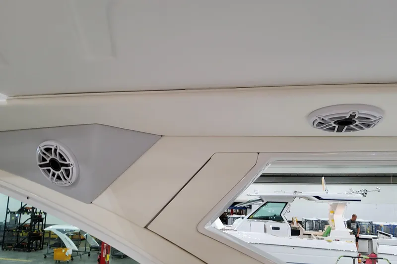 Slide: The Image of 2026 Formula 380 Super Sport Crossover OB interior with speakers and window view. - 93