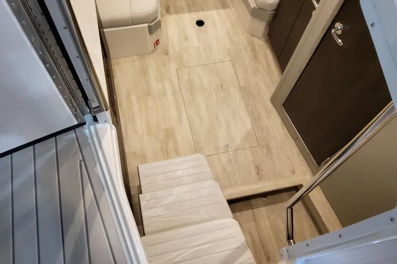 Slide: The Image of Interior view of 2026 Formula 380 Super Sport Crossover OB, featuring sleek wooden flooring. - 97