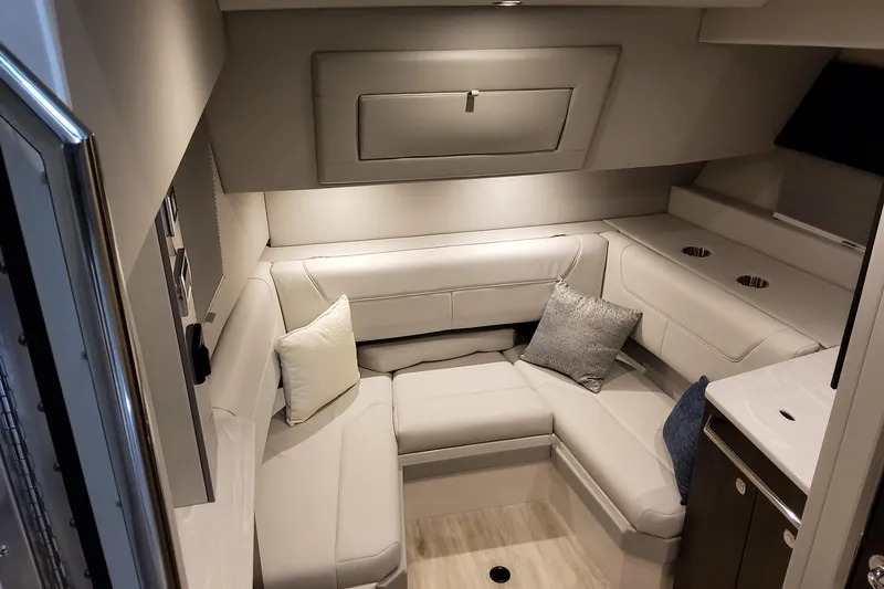 Slide: The Image of Luxurious interior of 2026 Formula 380 Super Sport Crossover OB boat cabin. - 99