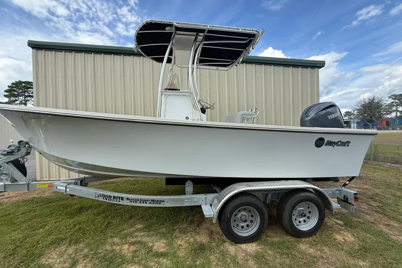 Slide: The Image of 2024 May-Craft 20 Cape Classic boat on trailer, parked outdoors. - 1