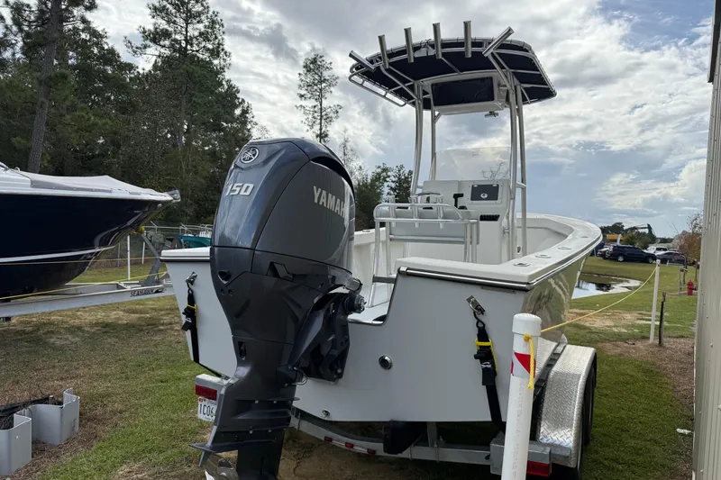 Slide: The Image of 2024 May-Craft 20 Cape Classic boat with Yamaha 150 engine on trailer. - 2