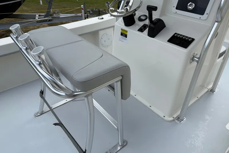 Slide: The Image of 2024 May-Craft 20 Cape Classic boat interior with helm and seating. - 7