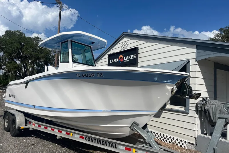 The Image of 2025 Blackfin 252 CC boat on trailer at Land O' Lakes Marine. - 0