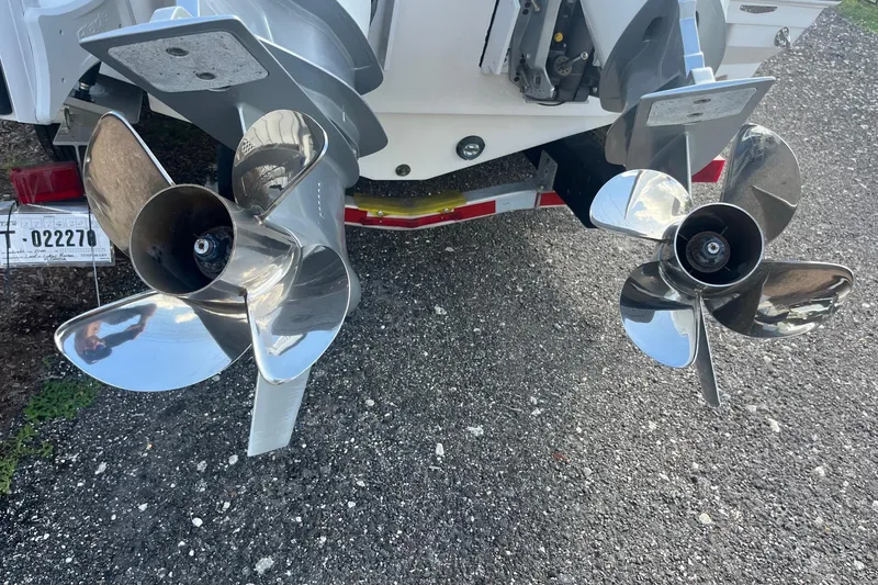 Slide: The Image of 2025 Blackfin 252 CC boat propellers on trailer, showcasing dual stainless steel blades. - 20