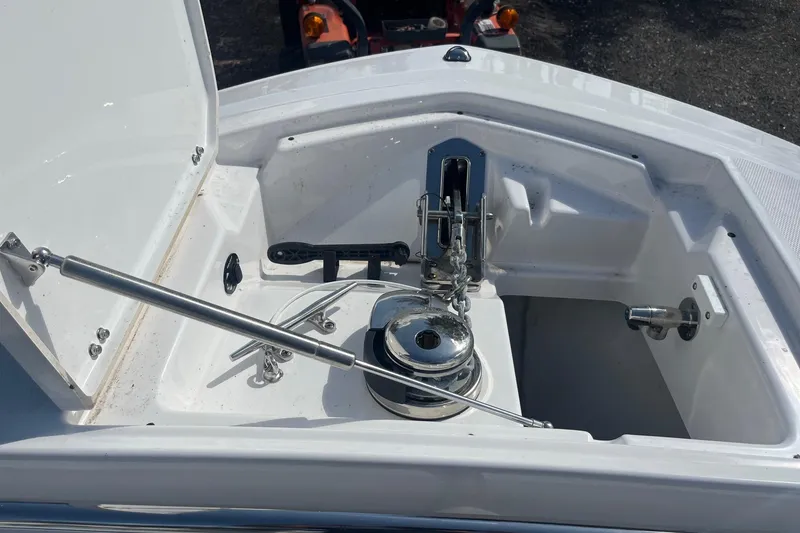 Slide: The Image of Anchor compartment of 2025 Blackfin 252 CC boat with stainless steel fittings. - 6