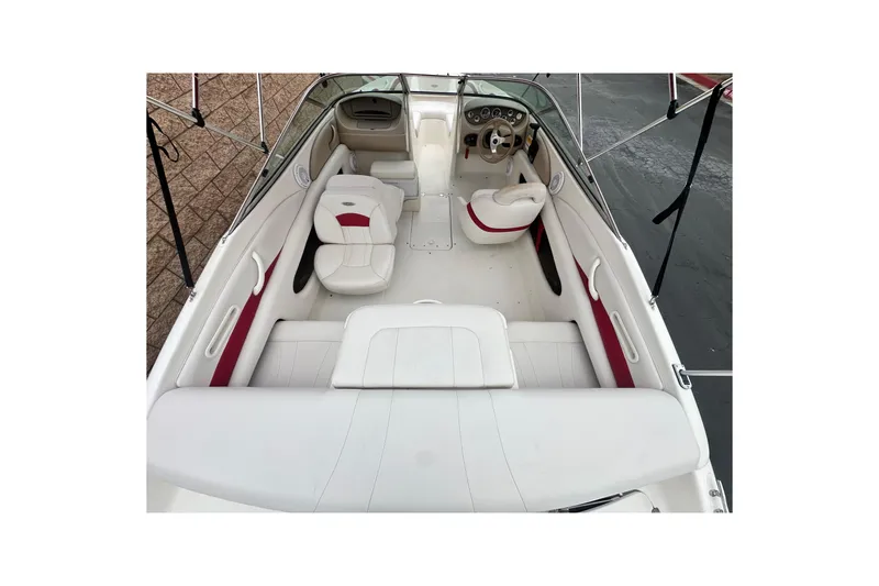 Slide: The Image of Dashboard of a 2002 Chaparral 183 SS boat with multiple gauges and controls. - 11