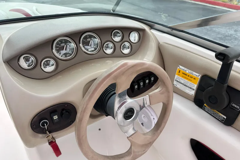 Slide: The Image of 2002 Chaparral 183 SS boat interior with black non-slip mat. - 15