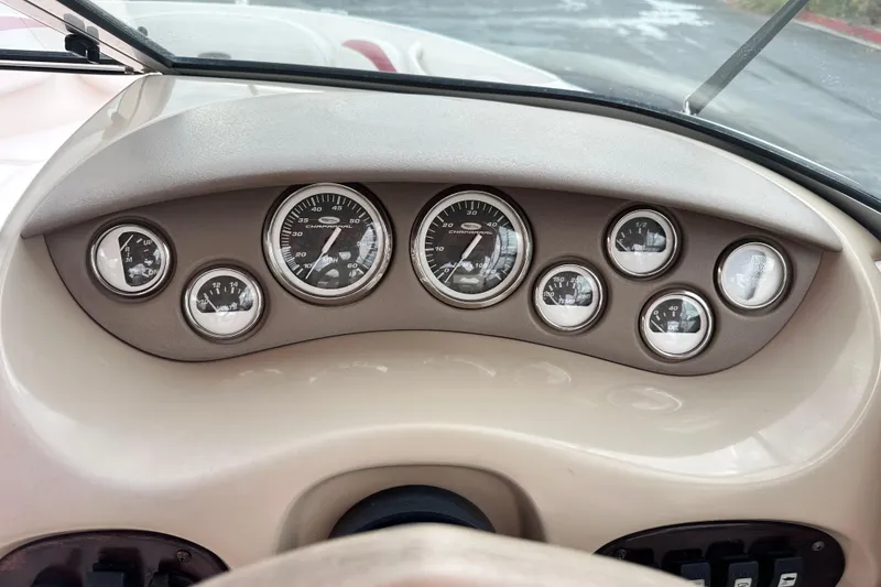 Slide: The Image of Trailer hitch of a 2002 Chaparral 183 SS boat on asphalt pavement. - 16