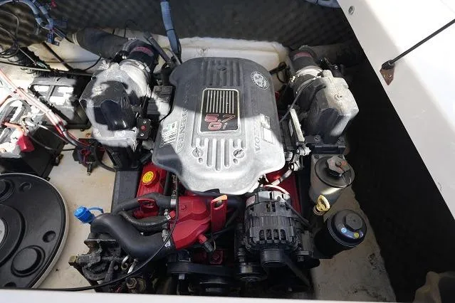 Slide: The Image of Engine compartment of a 2007 Rinker 226 Captiva Bowrider boat. - 14