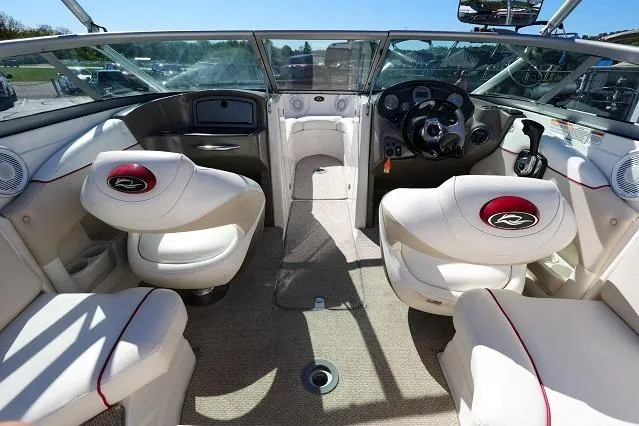 Slide: The Image of 2007 Rinker 226 Captiva Bowrider interior with steering wheel and seating. - 9