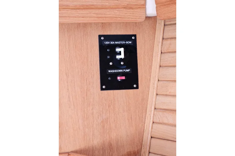 Slide: The Image of Control panel on 2006 Catalina 400 MkII yacht, featuring washdown pump switch. - 21