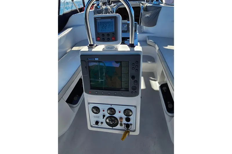 Slide: The Image of Cockpit navigation system of 2006 Catalina 400 MkII sailboat, featuring Raymarine electronics. - 4