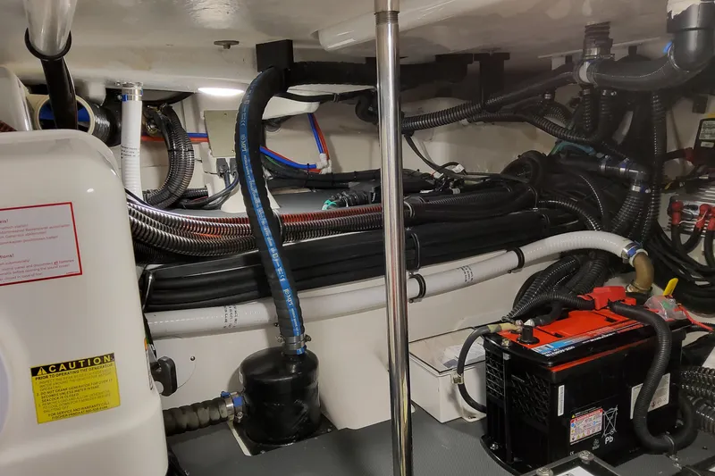 Slide: The Image of Engine room of 2026 Formula 457 Center Console Fish with wiring and battery. - 10