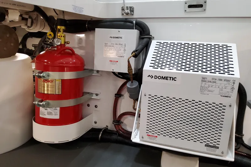 Slide: The Image of Engine room of 2026 Formula 457 Center Console Fish with fire extinguisher and Dometic equipment. - 14