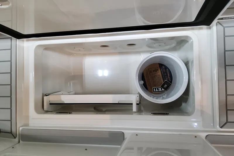 Slide: The Image of Interior storage compartment of 2026 Formula 457 Center Console Fish boat. - 37