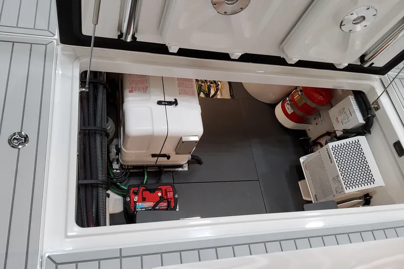 Slide: The Image of 2026 Formula 457 Center Console Fish engine compartment with advanced equipment and wiring. - 4