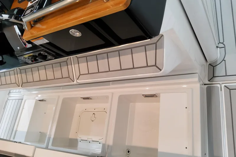 Slide: The Image of 2026 Formula 457 Center Console Fish boat interior with sleek storage compartments. - 46