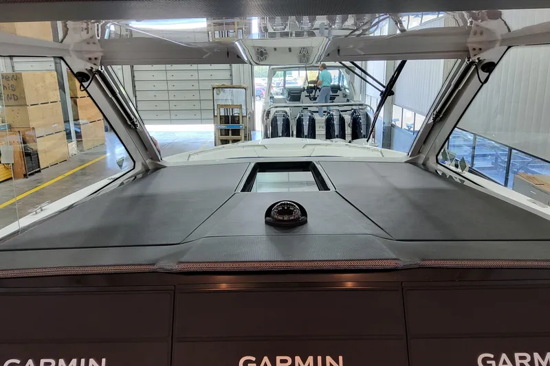 Slide: The Image of Interior view of 2026 Formula 457 Center Console Fish boat with Garmin navigation system. - 49