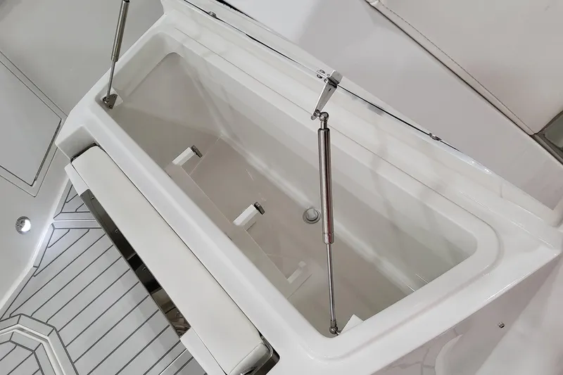 Slide: The Image of Open storage compartment on 2026 Formula 457 Center Console Fish boat. - 56