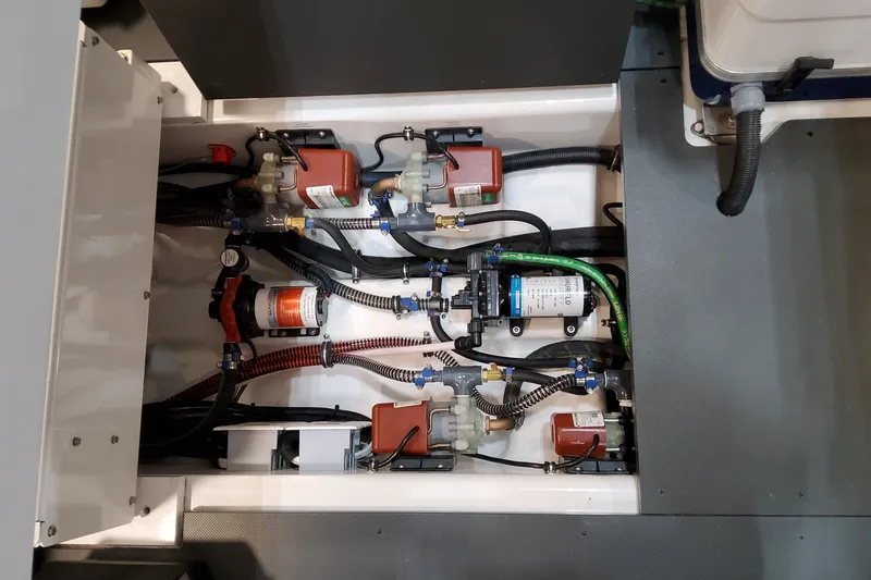 Slide: The Image of 2026 Formula 457 Center Console Fish boat engine compartment with wiring and components. - 6