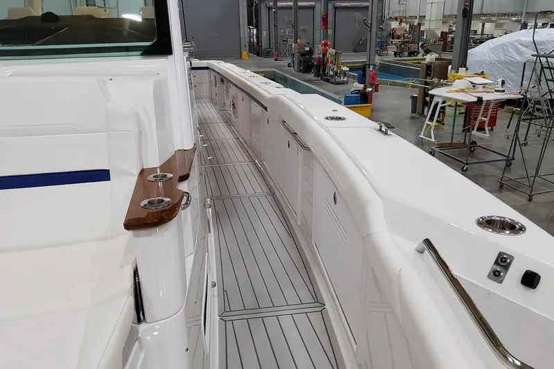 Slide: The Image of 2026 Formula 457 Center Console Fish boat interior with sleek design and modern amenities. - 63