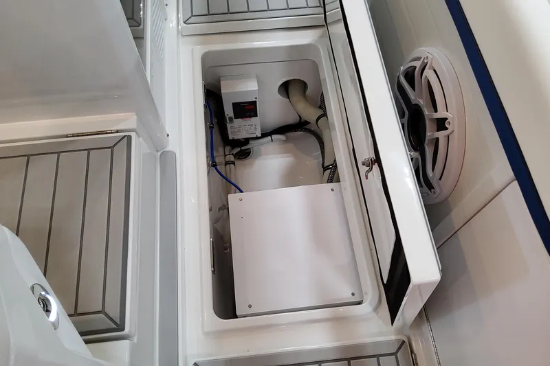 Slide: The Image of Open storage compartment in 2026 Formula 457 Center Console Fish boat. - 68
