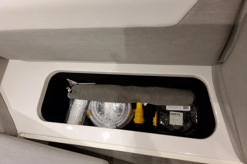 Slide: The Image of Storage compartment in 2026 Formula 457 Center Console Fish boat with accessories. - 76