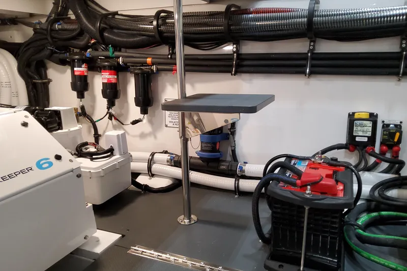 Slide: The Image of Engine room of 2026 Formula 457 Center Console Fish boat with advanced equipment and wiring. - 8